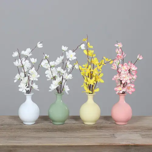 Pour valoriser vos extérieurs:Bouquet de branches florales artificielles dans vase - 30 cm